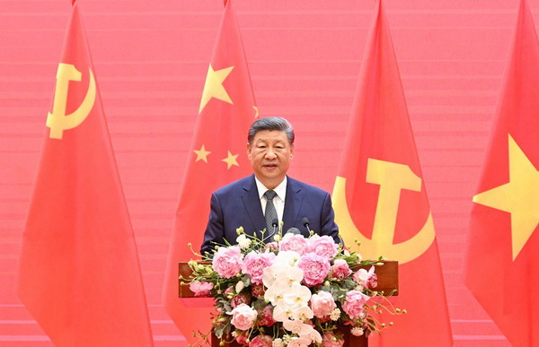 习近平会见中越人民大联欢活动代表时的致辞_缩小大小.jpg